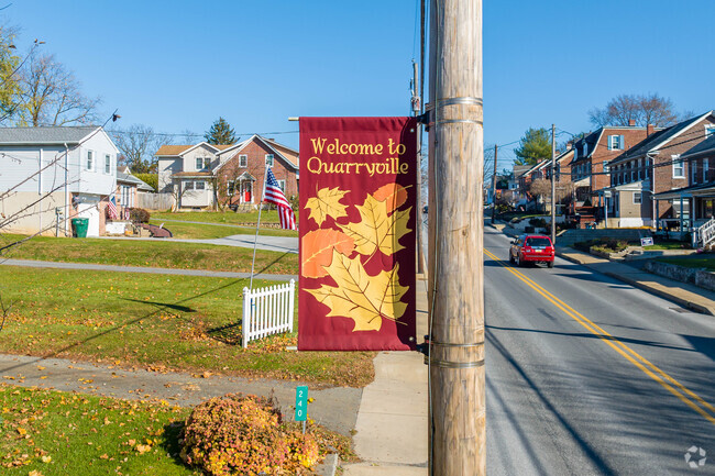 You'll find flags all over welcoming you to Quarryville.