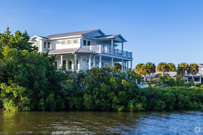 Stately homes overlooks the Indian River in Saint Lucie Village.