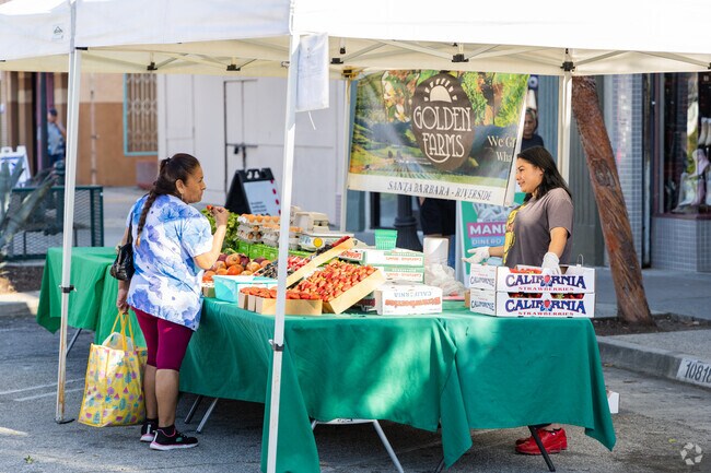 Grab a sample of Golden Farms strawberries at the El Monte Farmers Market.