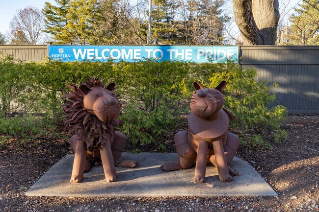Hofstra Univeristy's two mascots, Kate and Willie Pride welcome nearby Hempstead residents.