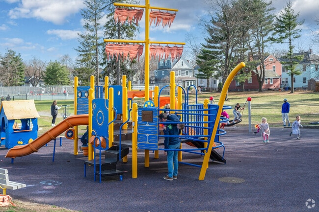 Children of Hillside Street burn off some extra energy at Kelly Field Playground.