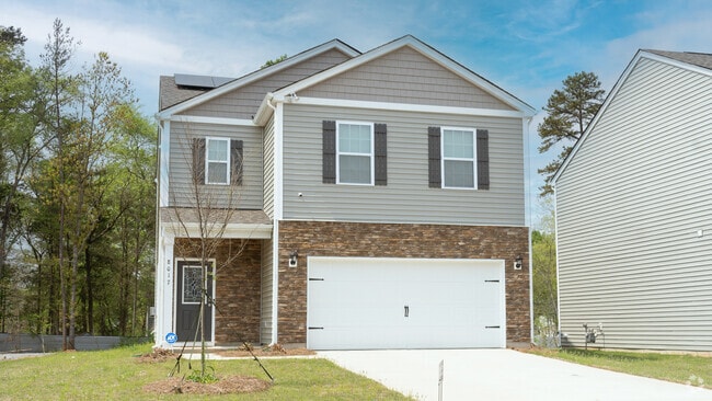 This Two-Story home with a single-car garage provides plenty of space for families in West Sugar Creek.
