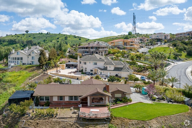 Single-story, two-story, and even three-story homes are located in Hacienda Heights.