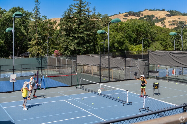 A pickleball instructor holds private lessons at Lafayette Tennis Club.