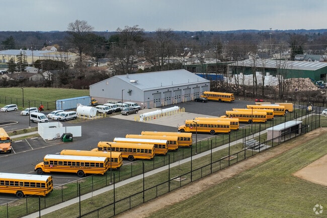 There are many school buses used to get the children to & from school in Levittown.
