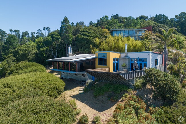 The beauty of homes in Panoramic Hill are the large windows letting in light and the huge views.