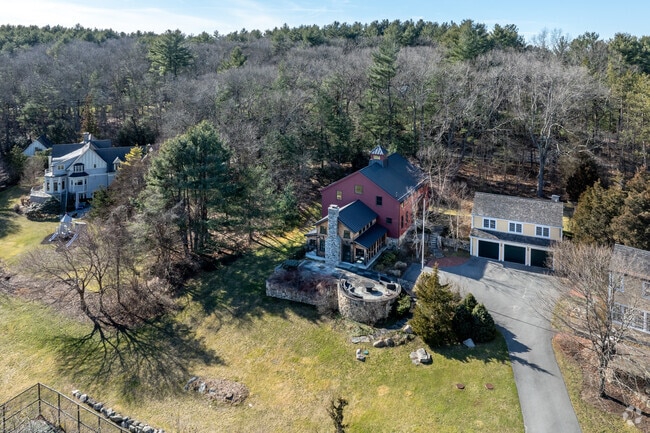 A group of large homes on generous lots commonly found in Weston, MA.
