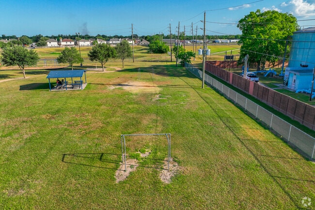 Students at Rees Elementary School enjoy the large open fields in Briar Village, TX.
