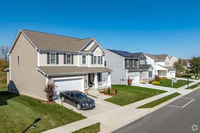 A row of charming new builds sits in a planned development in Hager's Crossing.