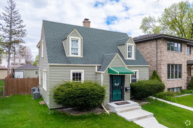 Cape Cod homes add a charming touch to Irving Woods' residential streets.