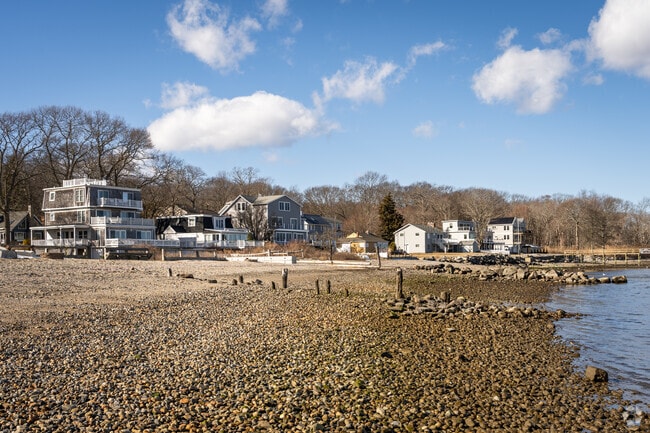 Find your dream three story colonial home with private beach access in East Passage Estates.
