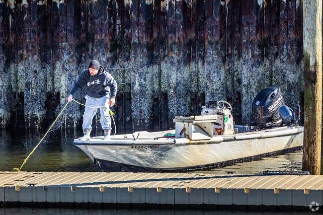 Sea Cliff resident prepares to check traps near the harbor.