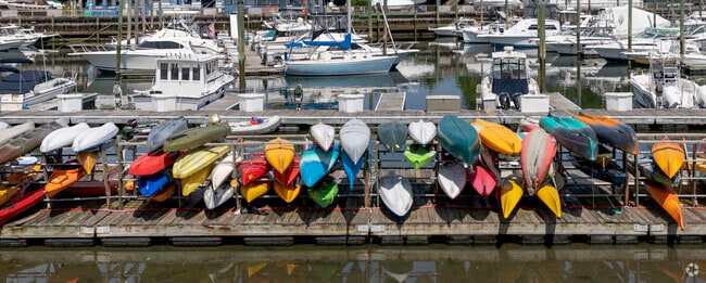 This coastal neighborhood combines serene shoreline beauty with vibrant seasonal water recreation.