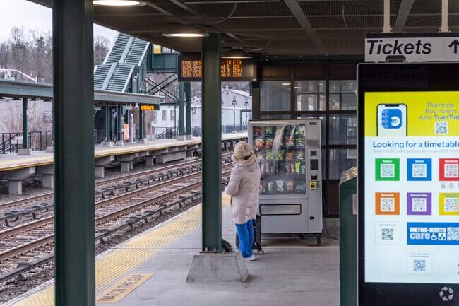 A traveler bound for NYC waiting for the train at the Tarrytown, NY station.