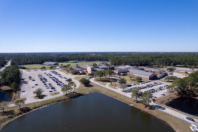 First Coast High school from above, neighboring a beautiful body of water in Jacksonville, FL.