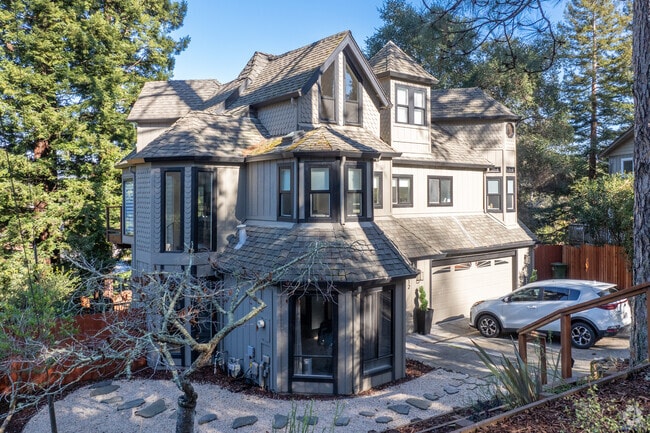 Steep gables and ornate trim define this Scotts Valley Victorian Gothic Revival home.