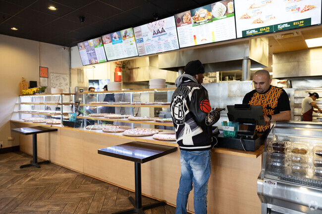 Bella's Pizza in the Westgate shopping center is a top rated slice in Roessleville.