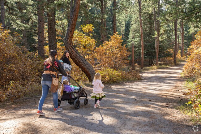 A couple of friends enjoy bringing their children to Pueblo Mountain Park in Beulah Valley.