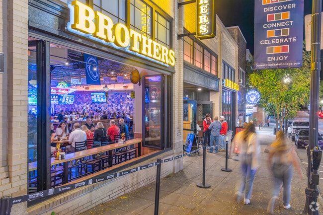 Popular restaurants like Brothers line the streets of downtown State College near Orchard Park.