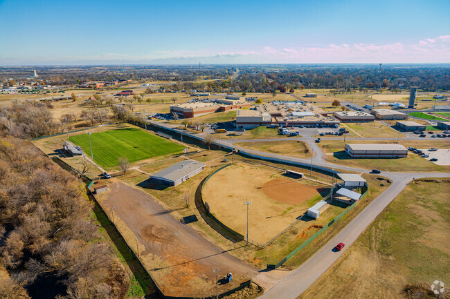 Sunny aerial view reveals the softball field and Memorial Stadium