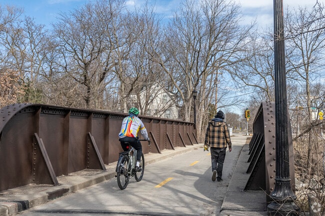 Bicyclists and walkers alike share the Capital City Trail in Marquette.