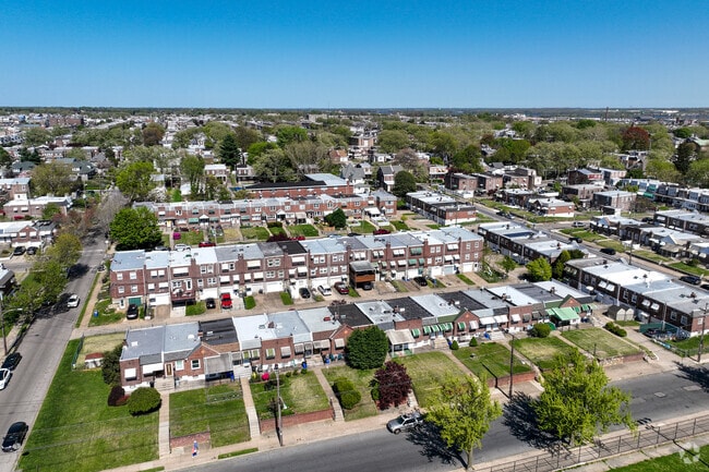 Mayfair neighborhood is made up of mostly row homes with on street parking and driveway parking.
