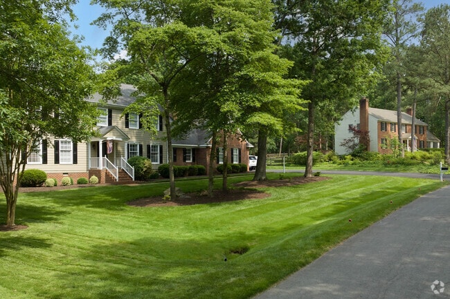 Gayton's neighborhood homes street view featuring lush lawns.