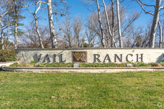The entrance of Vail Ranch proudly showcases its name on a prominent sign.