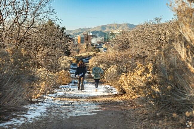 Women walk along Shoreline Trail towards the University of Utah in Foothill Sunnyside.