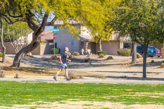 Residents enjoy a morning run at Moreno Park in El Mirage.