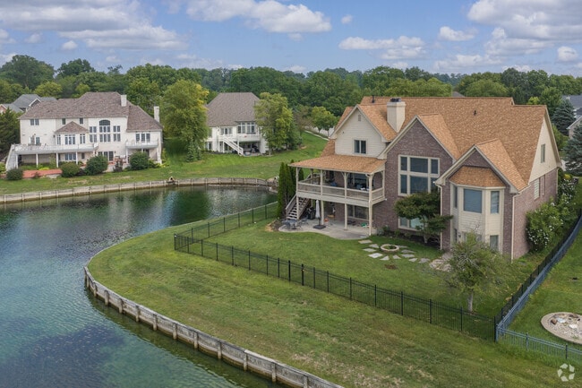 Here's an example of a newly built two story home on one of several small lakes in East Carmel.