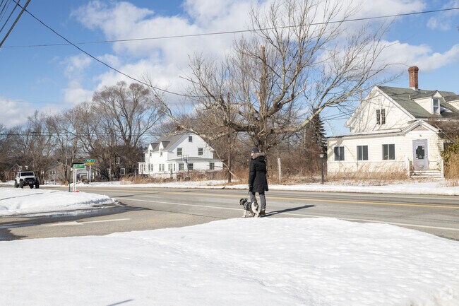 The pace of life in Dover Pointe is unhurried, allowing residents to savor the simple pleasures, like a leisurely walk.