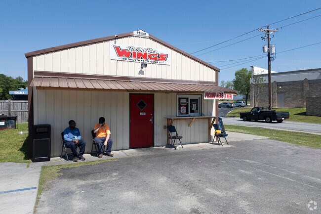 Customers wait patiently for their cooked-to-order lunches at Nothin' but Wings.