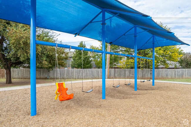 Swings for kids to enjoy at Eisenhower Elementary School in Norman.