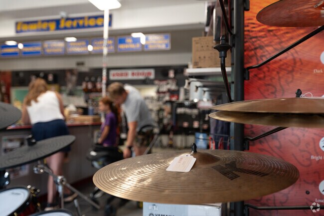 A young girl is getting her first violin for school at Fawley Music in Sabraton.