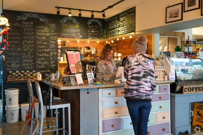 Order a unique latte at Cup of Joy Cafe.