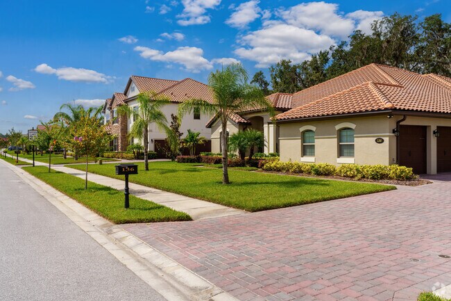 DeBary showcases a breathtaking row of homes with tile roofs and manicured lawns.