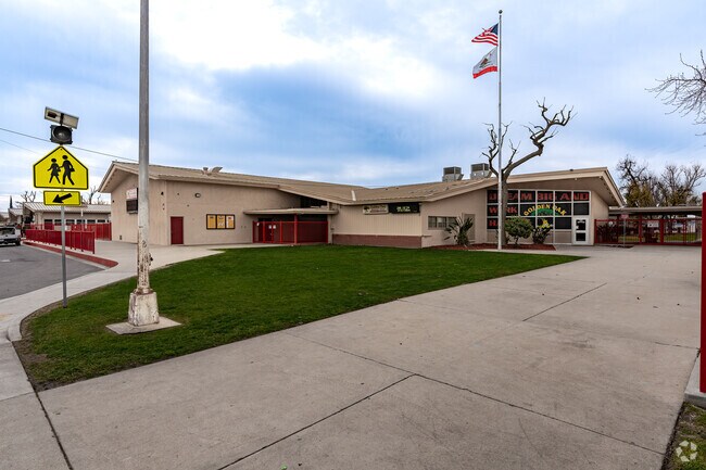 The flags fly high in front of Golden Oak Elementary.
