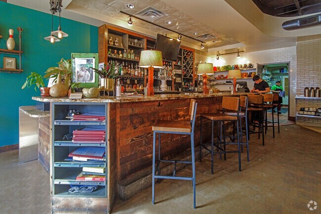 Cozy up to the bar or enjoy patio seating at Milton's Vittles, Vinos, and Beer in Crystal, MN.