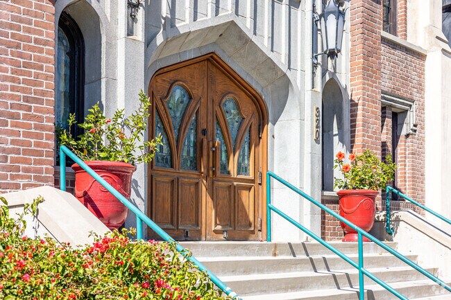 Grand entrance with handrails into the church.