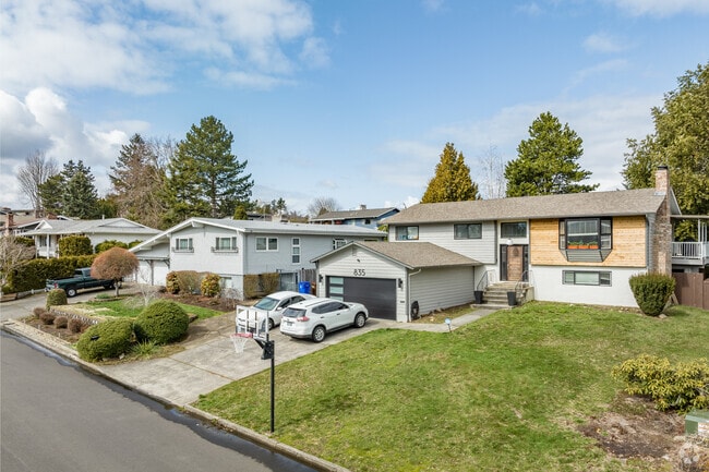 Upgraded split-level houses showcasing refreshed exteriors in Northwest Gresham.