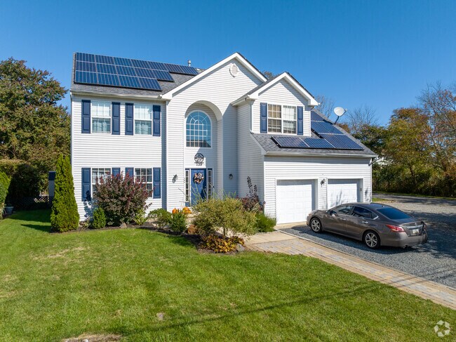 Larger colonial style homes are located in various neighborhoods in Ocean Township.