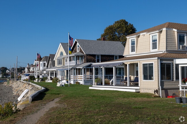 Neutral-toned homes line the coast in The Alphabets.