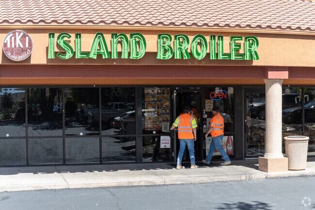 Near Painted Desert, Tiki Island serves Hawaiian dishes in a tropical beach-themed interior.