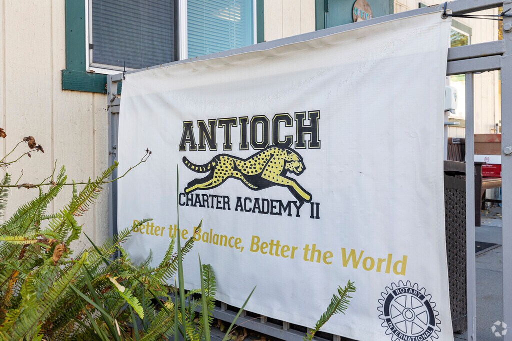 Antioch Charter Academy II students immerse themselves in a hands-on environmental science lesso