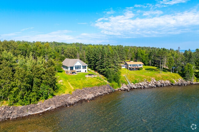 Luxury waterfront homes overlook the water on the outskirts of Two Harbors.