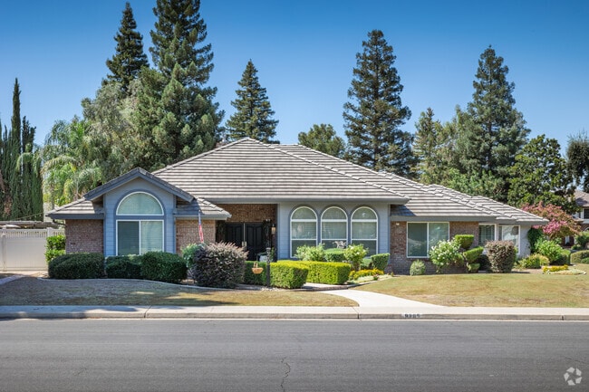 Home with arched windows and brick siding seen in Haggin Oaks.