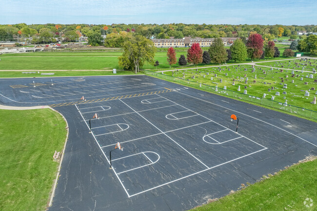 Clinton Rosette School is has outside basketball goals and a soccer field in Dekalb, Illinois.