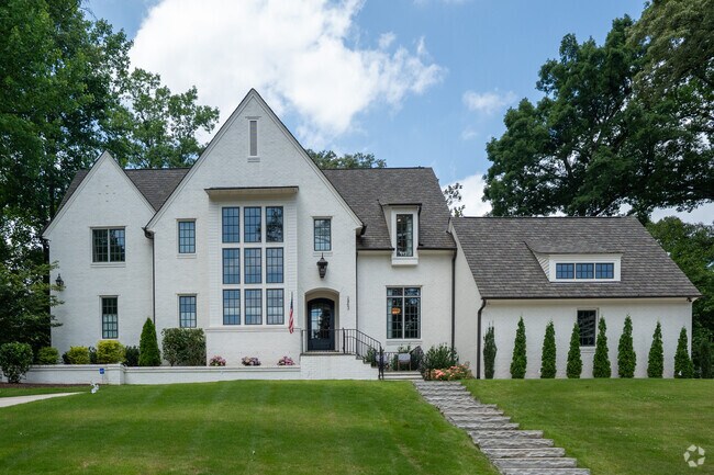 Larger, eclectic Tudor-inspired homes are sprinkled throughout.