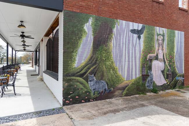 There are several murals adorning the buildings of downtown Arab, Alabama.